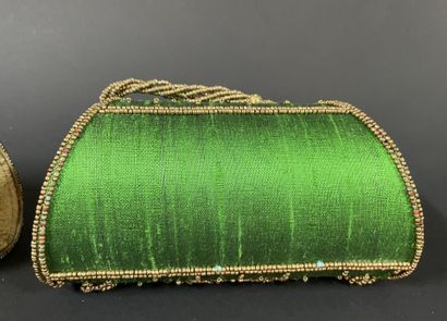 Four pouches embroidered with Indian silk.
Minor...