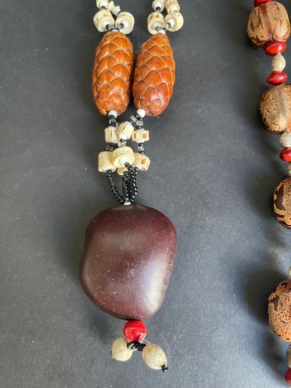 Two necklaces made of walnut beads, semi-precious...