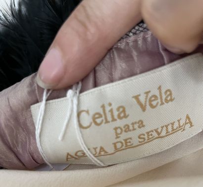 CELIA VELA PARA AGUA DE SEVILLA
Black feather...