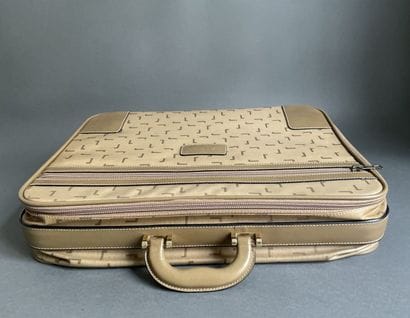 LANCEL
Two suitcases in coated canvas and...