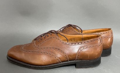 JM WESTON
Pair of brown leather lace-up derbies...