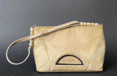 Christian DIOR
Beige nylon bag with magnetic...