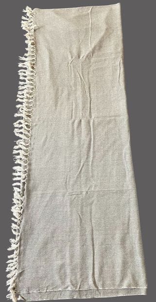 MADURA
Two plaids, one in mottled gray cotton,...