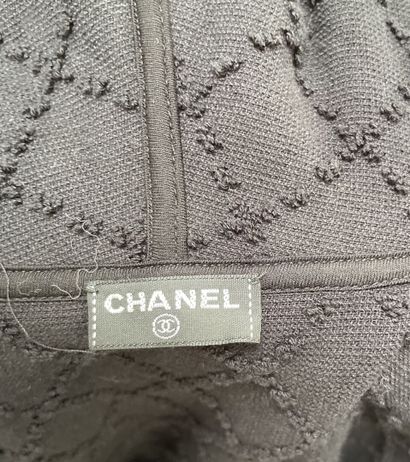 CHANEL
Black terry cloth dress with a hood,...