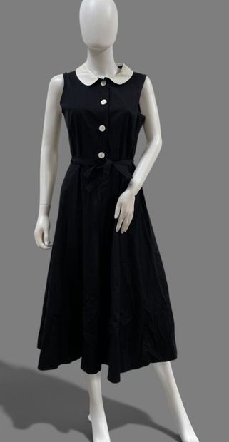AGNES B. 
Long, sleeveless black cotton dress...