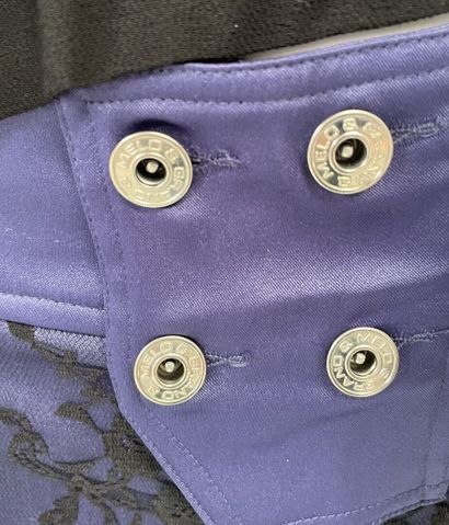MELO E GRANO 
Burgundy pants accented with...
