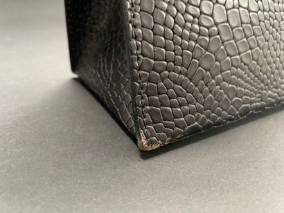 KENZO
21-cm bag made of reptile-embossed...