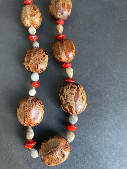 Two necklaces made of walnut beads, semi-precious...