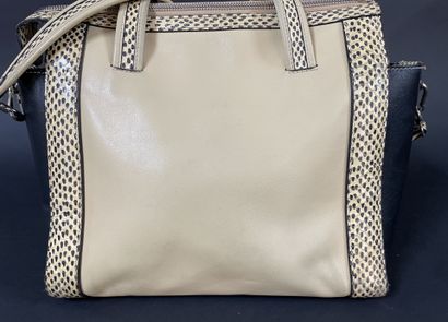 Sonia RYKIEL
Beige and black leather bag...