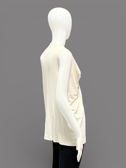 LANVIN SUMMER 2015 
Asymmetrical beige sleeveless...