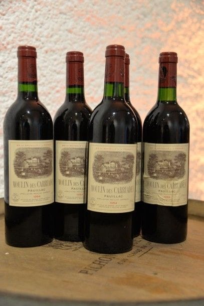 5 Bouteilles Moulin des Carruades 1984, niveaux:...