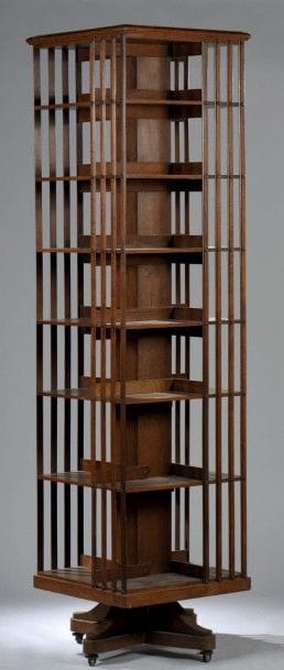 Importante bibliothèque tournante en bois...