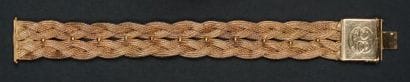 Bracelet manchette articulé en or jaune 18K...