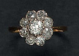 Bague marguerite en or jaune 18K (750°/00)...