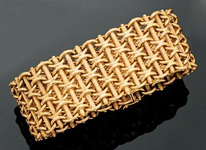Bracelet manchette articulée en or jaune...