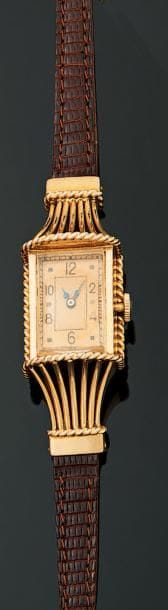 Montre bracelet de dame en or jaune 18K (750°/00)....