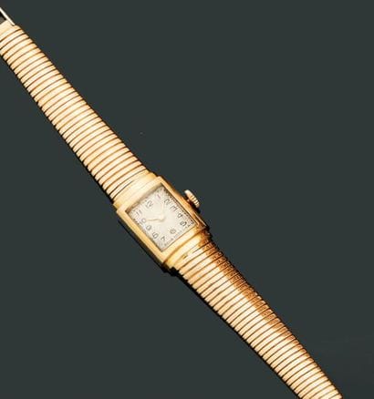 Montre de dame en or jaune 18K (750°/00)....