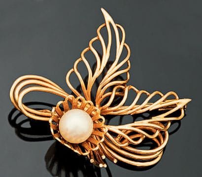 Broche feuillage en or jaune 18K (750°/00)...