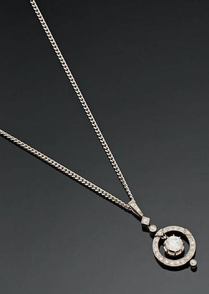 Chaîne en or gris 18K (750°/00) maille gourmette...