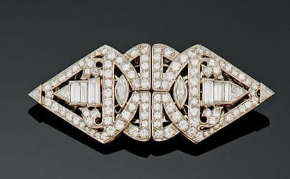 Broche double clip en or blanc 18K (750°/00)...