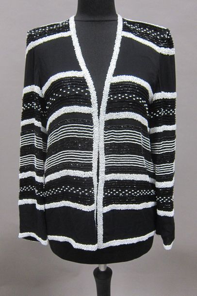 ODICINI, Louis VUITTON

ODICINI : Veste en...