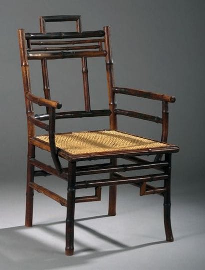 Fauteuil en bambou teinté, à dossier ajouré...