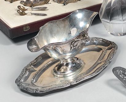 Saucière sur son dormant en argent (950),...