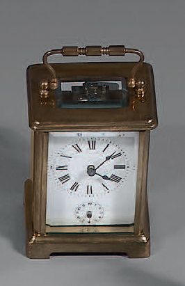 Pendulette d'officier, caisse en laiton doré,...