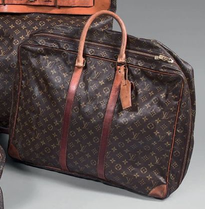 LOUIS VUITTON

Sac de voyage modèle Scirus,...