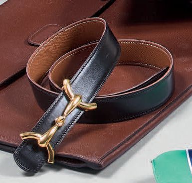 HERMES Paris

Ceinture en cuir noir et cuir...
