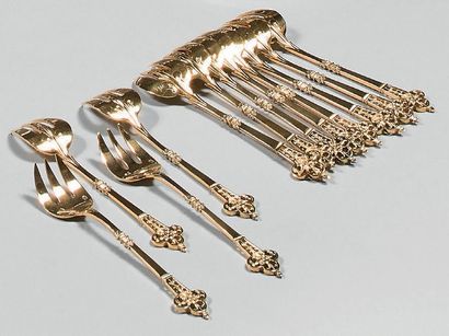 Suite de douze fourchettes à huîtres en vermeil...