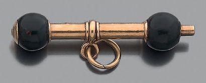 Clé de montre en or jaune 18K (750), ornée...