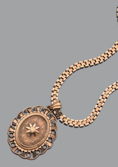 Pendentif ovale en or jaune 18K (750), le...