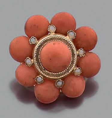 Broche ronde en or jaune 18K (750), stylisée...