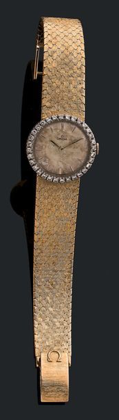 Montre de dame en or jaune 18K (750), mécanique,...