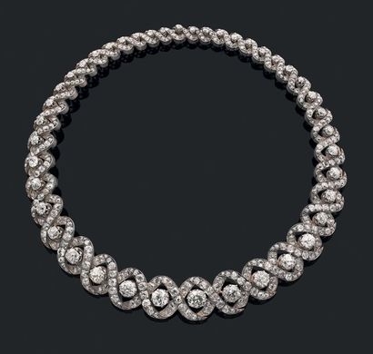 Collier souple en or jaune 18K (750) et argent,...