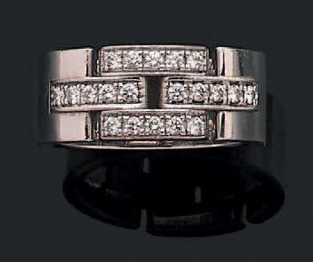 Bague formée de maillons “Panthère” en or...