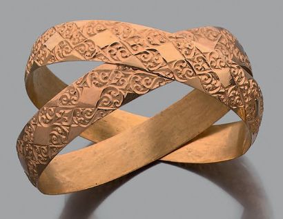 Deux bracelets rigides en or jaune 14K (585),...