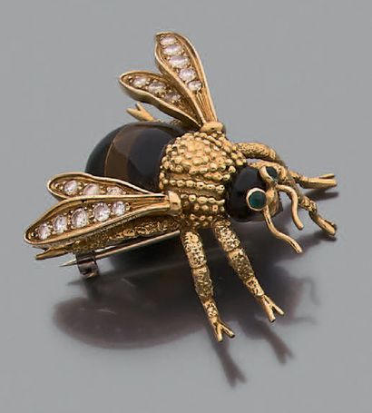 Broche en or jaune 18K (750), stylisée d'un...