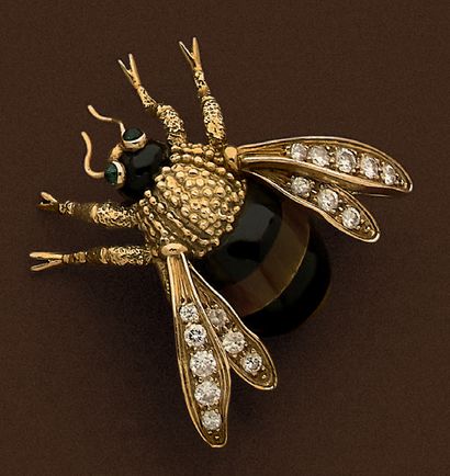 Broche en or jaune 18K (750), stylisée d'un...