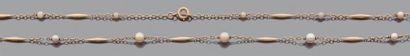 Collier souple en or jaune 18K (750) à maille...