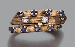 Bague en or jaune 18K (750), formée de trois...
