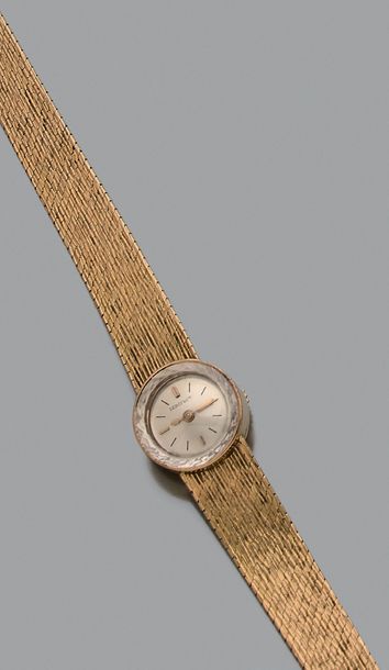 Montre bracelet de dame mécanique en or jaune...