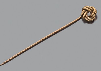 Deux épingles de cravate en or jaune 18K...