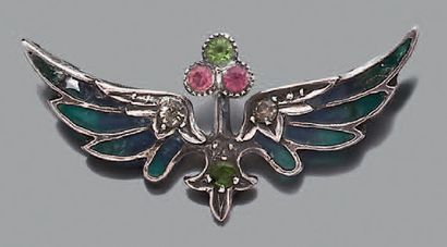 Broche pendentif en métal, figurant une paire...