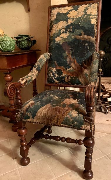 Armchair in fruitwood, the high flat rectangular...