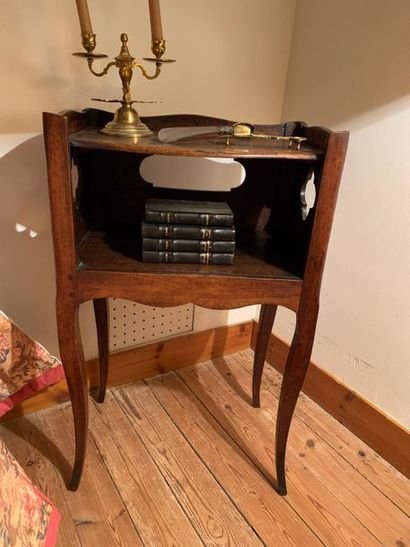 Small bedside table in moulded fruitwood....