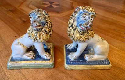 Pair of polychrome earthenware statuettes...