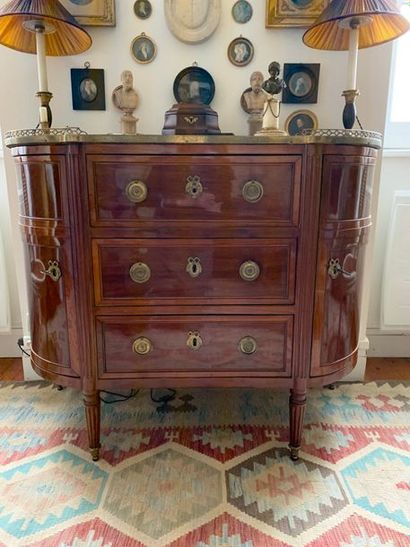 Half moon chest of drawers with flat front...