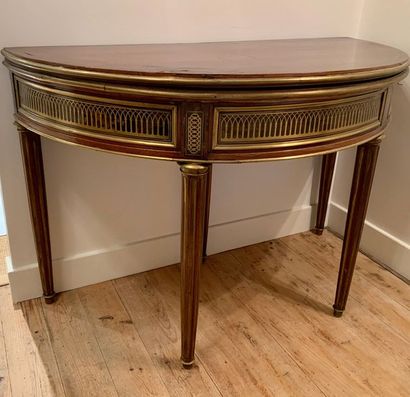 Mahogany and mahogany veneer half moon table....